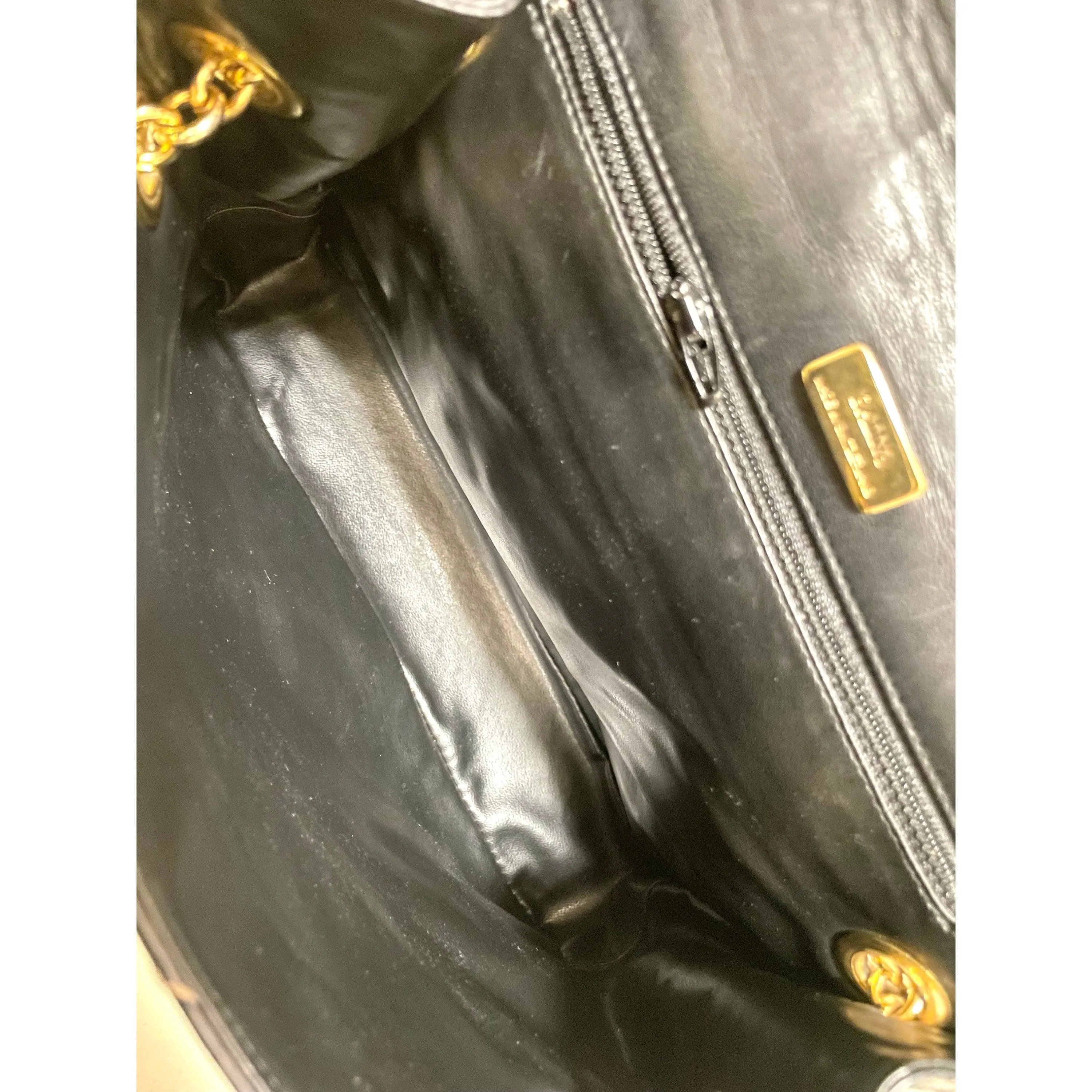 Vintage BALLY black leather shoulder bag with white leaf stitches and chain strap. 060310ya1